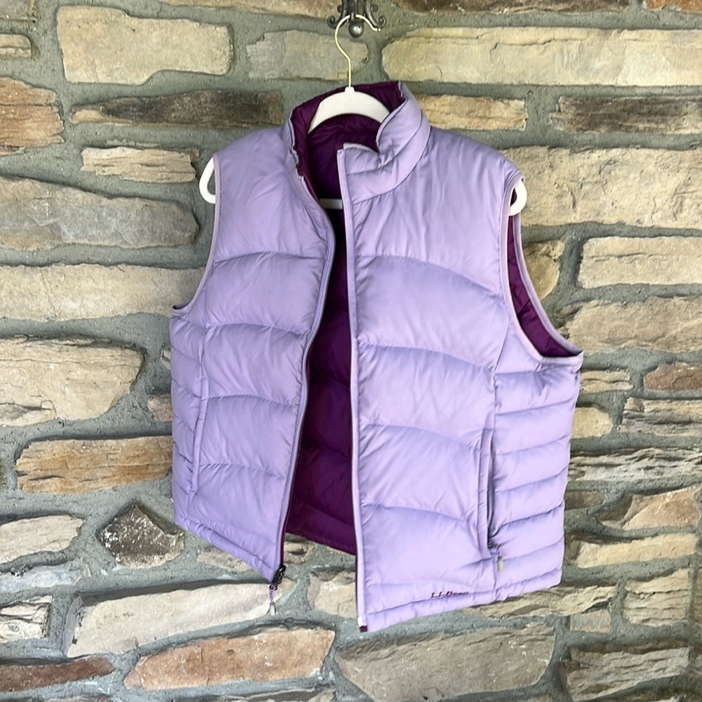 Like new without tags… Reversible, lavender, and purple down vest L.L. Bean